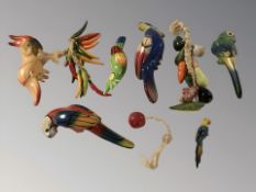 A group of decorative Mexican ceramic birds of paradise on metal hanger