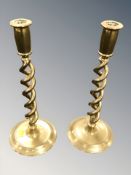 A pair of brass barley twist candlesticks,