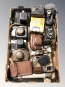 Vintage cameras including Compur Rolleicord twin lens camera, others including Zenit,