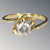 An 18ct yellow gold solitaire diamond ring, size S.