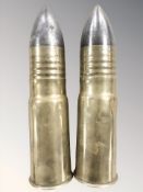 Two inert shell casings,