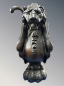 A cast iron figure of a Griffin,