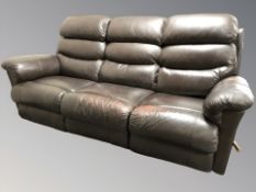 A Lazboy brown stitched leather three seater manual reclining settee, length 212 cm,