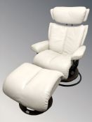 A Norwegian Ekornes stressless cream leather armchair and footstool