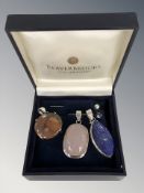 Three silver and hard stone pendants including lapis lazuli and two pins