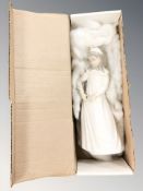 A Nao figure of a girl in night dress, height 29 cm,