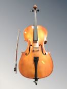 A modern child's cello with two-piece 25.