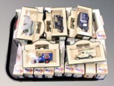 A collection of Days Gone die cast delivery vans in boxes