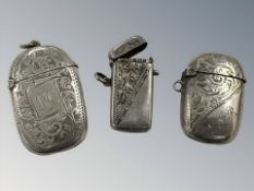 Three antique silver vesta cases, largest 5 cm long. CONDITION REPORT: 46.1g gross.