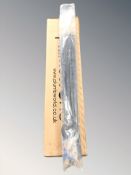 A set of drain rods in box