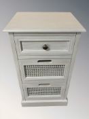 A modern three drawer stand,