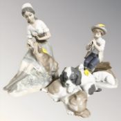 A Nao figure - Lady with dog and two further groups