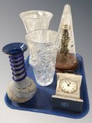 Two crystal vases, Rapport brass skeleton clock under conical dome,