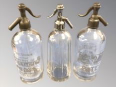 Three etched glass soda siphons, one marked Rawlings, the other two Batey & Co,