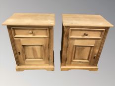 A pair of modern pine bedside cabinets,