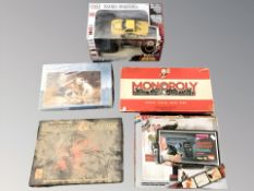 A group of toys and models including Colt 25 pistol model kit, Dungeons and Dragons game, puzzle,