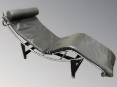 A Le Corbusier style chrome and black leather lounge chair/day bed,