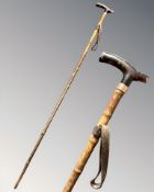 An early 20th century bamboo and faux tortoiseshell walking stick with 9ct gold ferrule,