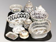 A Herend porcelain basket decorated with butterflies and blossoms, further Herend circular basket,