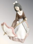 A Lladro figure - Girl with parasol 5210