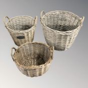 Three wicker laundry baskets,