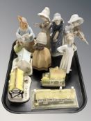 A group of Coalport porcelain cottages, Lladro figures,
