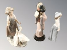 A Lladro Geisha and two Nao figures,