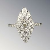 An Art Deco platinum and diamond ring, size O CONDITION REPORT: 2.