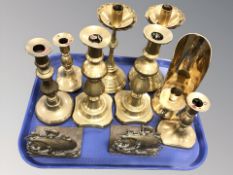 Three pairs of 19th century brass candlesticks,