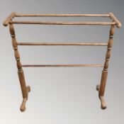 A Victorian beech towel rail,