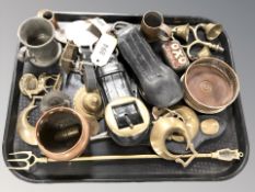 A group of horse brasses, pewter wares,