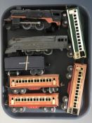 20th century Lionel tin plate locomotives and passenger cars.