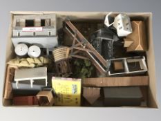 Assorted model railway buildings, scenery and decorations.
