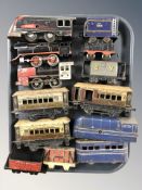 20th century tin plate locomotives passenger cars including wind up examples.