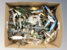 A group of die cast scale model aircraft.