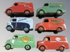 Six Corgi tin plate delivery vans including Capstan, Dunlop and Esso.