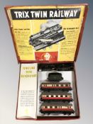 A Trix twin railway tin plate train set, in box.