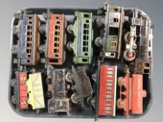 A group of 20th century tin plate locomotives and tenders including wind up examples.
