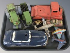 A group of 20th century tin plate vehicles including police car, steam engine,