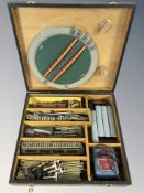 A 20th century tin plate train set with various passenger cars, control unit, length of track,