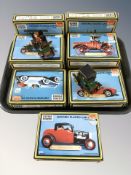 Nine Dapol Highway Pioneers scale model cars in boxes.