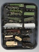 A group of die cast locomotives and tenders including Trix and Hornby