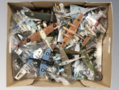 A group of die cast scale model aircraft.