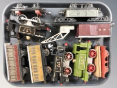 A group of 20th century tin plate locomotives and passenger cars.