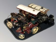 A group of hand-made models of steam engines