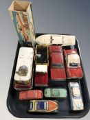 Several 20th century tin plate cars, a Penguin clockwork powered boat.