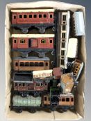 20th century tin plate passenger cars, wagons and other rolling stock.