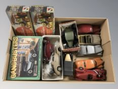 A group of die cast classic cars, two scale model traction engine building kits,