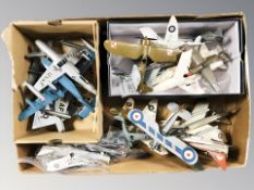 A group of die cast scale model aircraft.