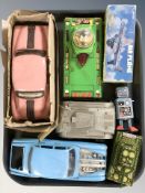 A group of 20th century Japanese tin plate models, wind-up robot, two model cars.